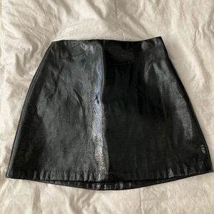Shiny black mini skirt